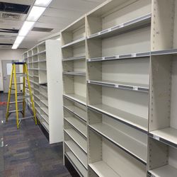 $50 - per single metal shelving unit with 10 adjustable height shelves per unit (84” x 30” x 7.5”)