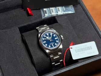 Tudor Black Bay 32 “smiley” blue dial