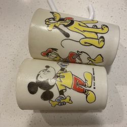 Vintage Disney Kids Cups 1970s. All three characters; Mickey Mouse, Donald Duck and Pluto, are depicted on each cup. Solid plastic, 5 oz each.