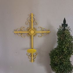 Yellow metal cross. So pretty