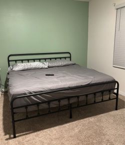 Metal style bed frame. King.