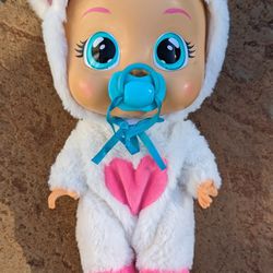 Cry Babies Daisy, Interactive" Baby Doll Cat,  Cries Real Tears, Works Great 

Introducing Cry Babies Daisy, an interactive 12-inch baby doll cat that