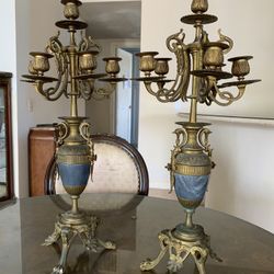 A Pair Of Antique Bronze Candelabras