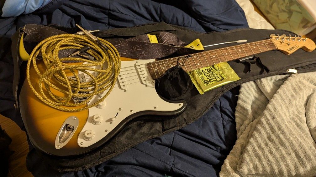 Fender starcaster electric guitar and accessories