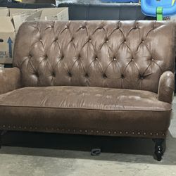 brown leather love seat 