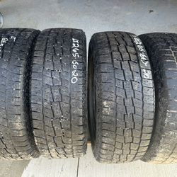 SET OF 4 LEXANI TERRAIN BEAST AT LT265/60R20 10PL ONLY $300 RETAILS NEW FOR $784