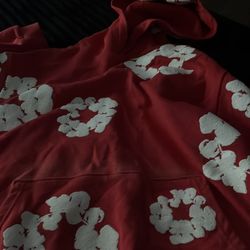 Small red denim tear