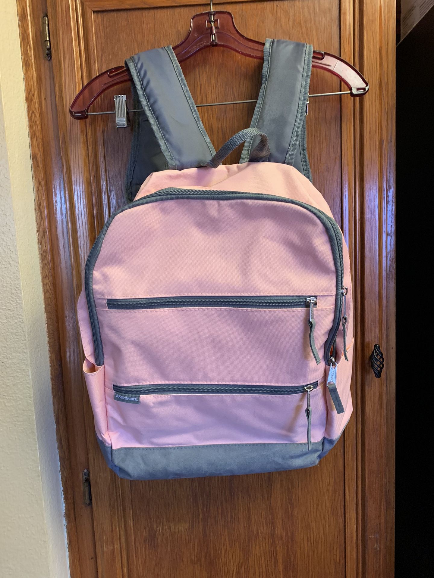 Like new lightweight, pink and gray backpack