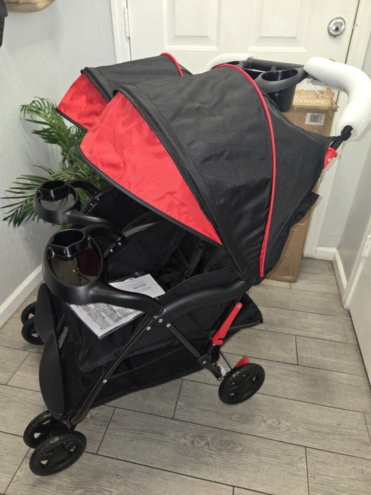 Kolcraft Cloud Plus Lightweight Double Stroller Side-by-Side for Infant Toddler, Compact Folding Travel System , Carreola