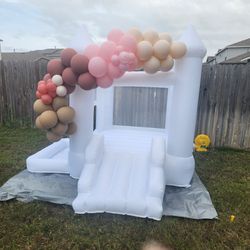 Balloon Garland  and Bounce House 