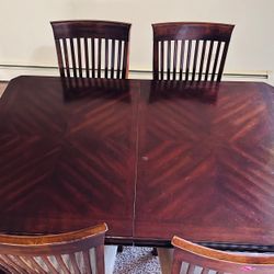 Dining Table (Length 58”, width 42”) with 4 chairs