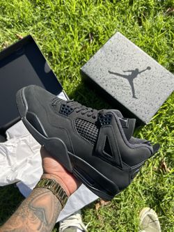 Black Cat Jordan 4’s