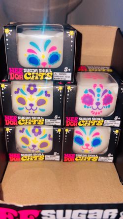 Authentic sugar glow skull cat Needohs $$25 each firm pick up only