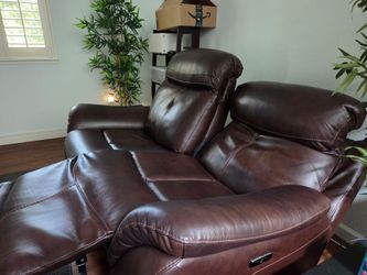 Two seated power leather recliner and rocker (very comfortable)