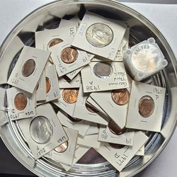 Mixed Set Of Coins In Cookie Can