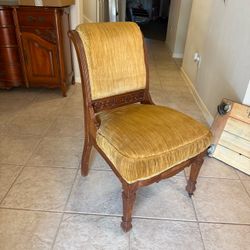 antique Victorian-style wooden side chair upholstered textured gold fabric with small front casters  PICK UP IN DEER PARK 77536
