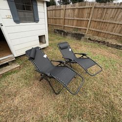 Two Reclining Lounge Chairs