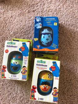Three Sesame Street KidzMouse Never been used still in package. Make offer