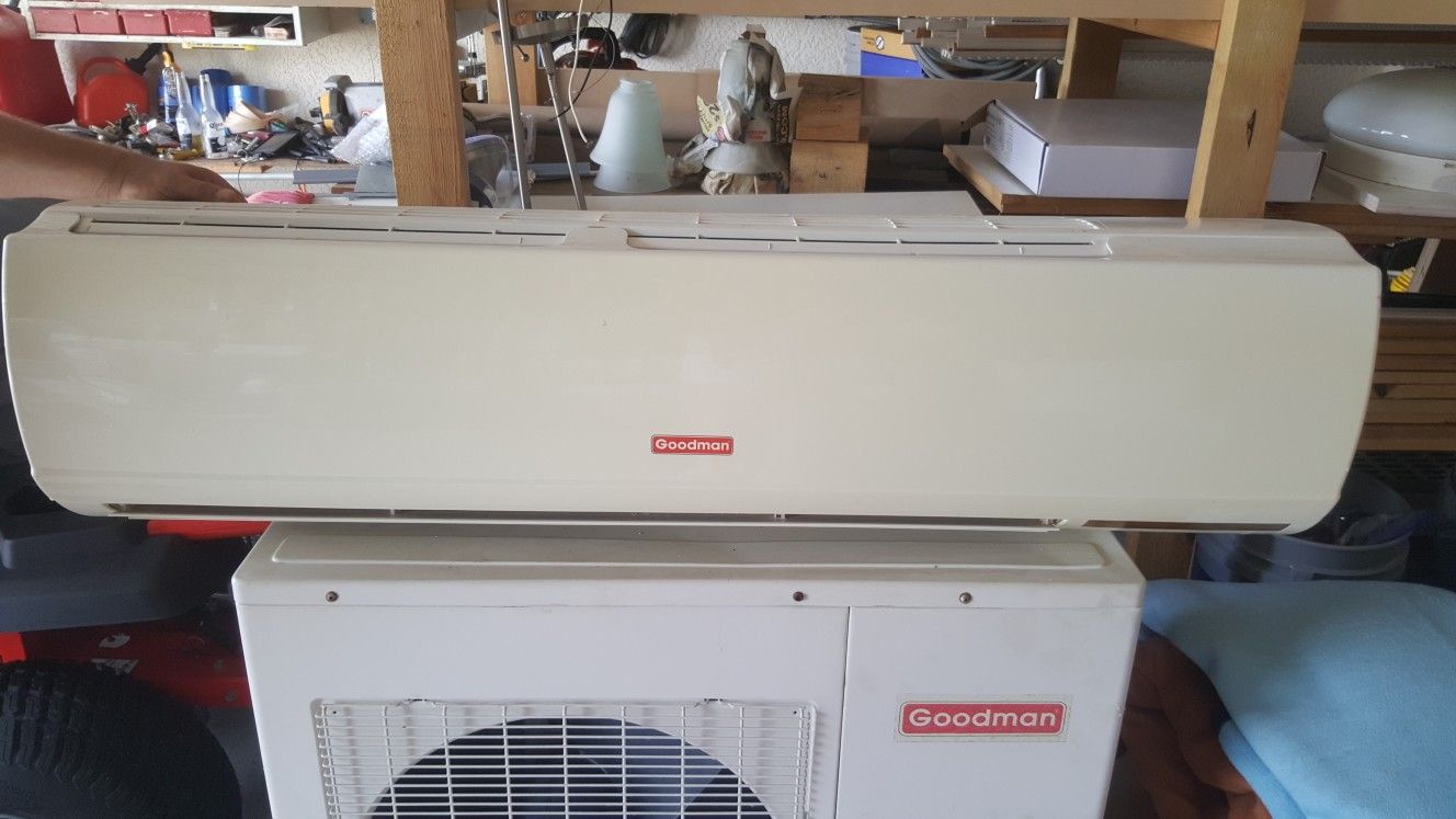 Goodman ac unit with remote control ready to be installed with pipe as well