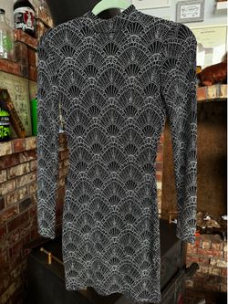 Open-back glittery long sleeve mini dress