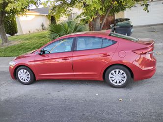 Hyundai Elantra Red 4-Door Sedan