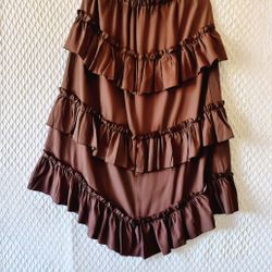 Mid-calf skirt, brown, with fringe throughout. Size M. Cost: $15.