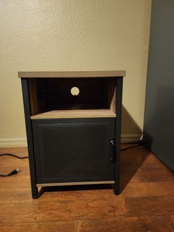 Nightstand with electrical and cell phone charging station