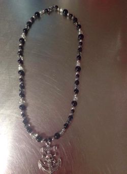Akull and crossbones anchor necklace