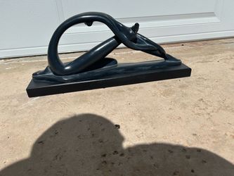 Black Abstract Figure Sculpture on Base