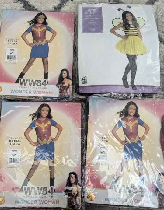 Girls Halloween Costumes, Size 4 - 6, 8 - 10, 12 - 14.  $10 each.