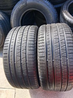 295-40R20 (106 V) 2 PORSHE TIRES PIRELLI SCORPION VERDE ALL SEASON (NO) TREAD  85%(8.5/32") $380.00 INSTALL MOUNTED AND BALANCED