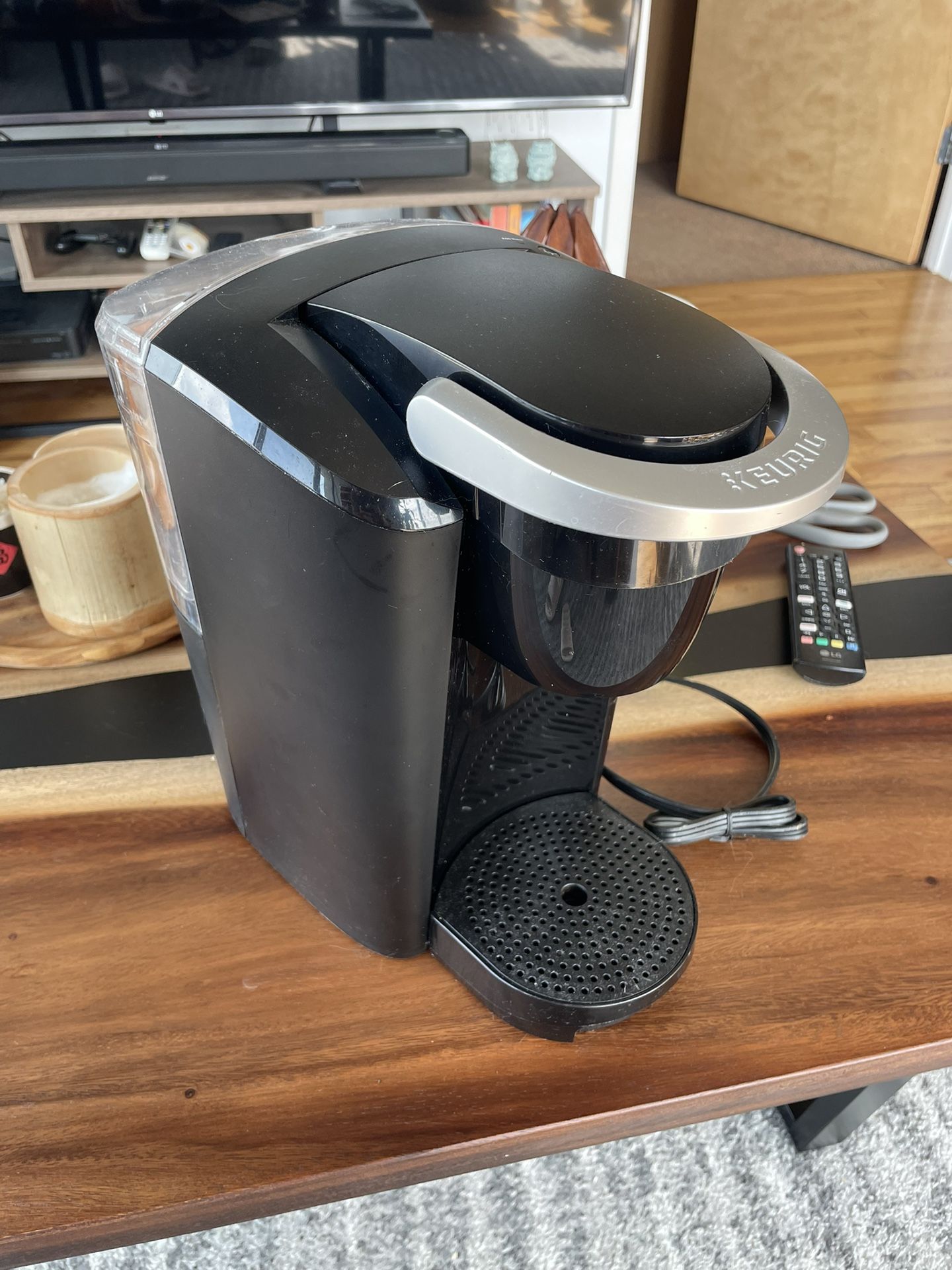 Keurig Coffee Machine With A Box Of Starbucks Pods 