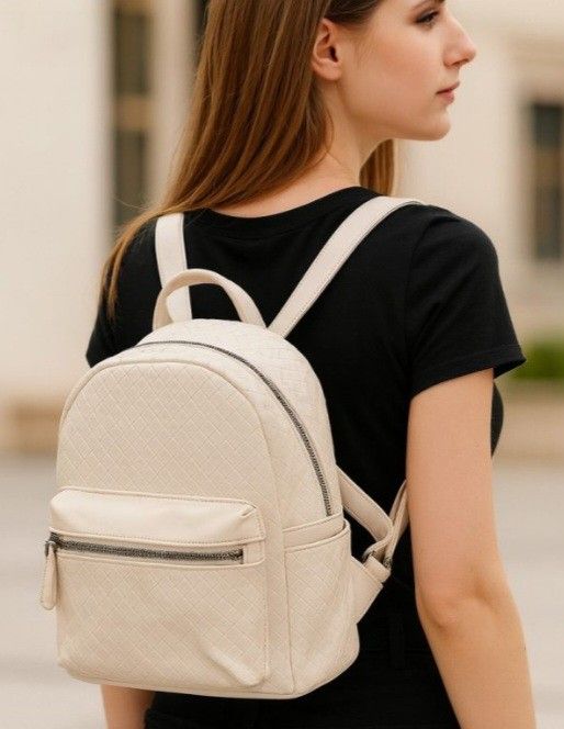 New Mini Backpacks Stylish In Black Or Tan Colors.  $15 Each