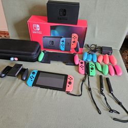 Nintendo Switch with Carrying Case And Pink Green Extra Controllers And Original Box