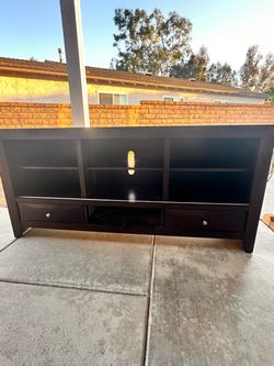 TV unit… brown wood