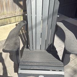 Four black Adirondack Chairs 