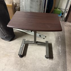 Dark Wood Adjustable Height Table on Wheels