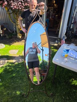 Whimsical Iron oval self standing mirror 
72"h x 22"w