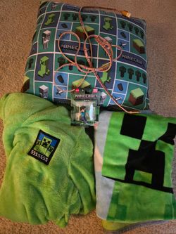 Minecraft pillow, blanket, robe, phone charger and character