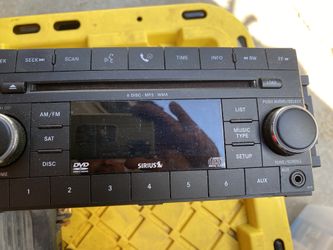 Chrysler And Jeep Radio  For Sale Works Great  Cd And Sirius Radio 6 Disk.mp3.WMA 