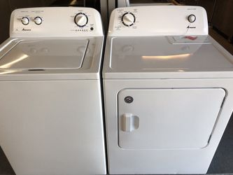 Used Amana washer and dryer set. 1 year warranty