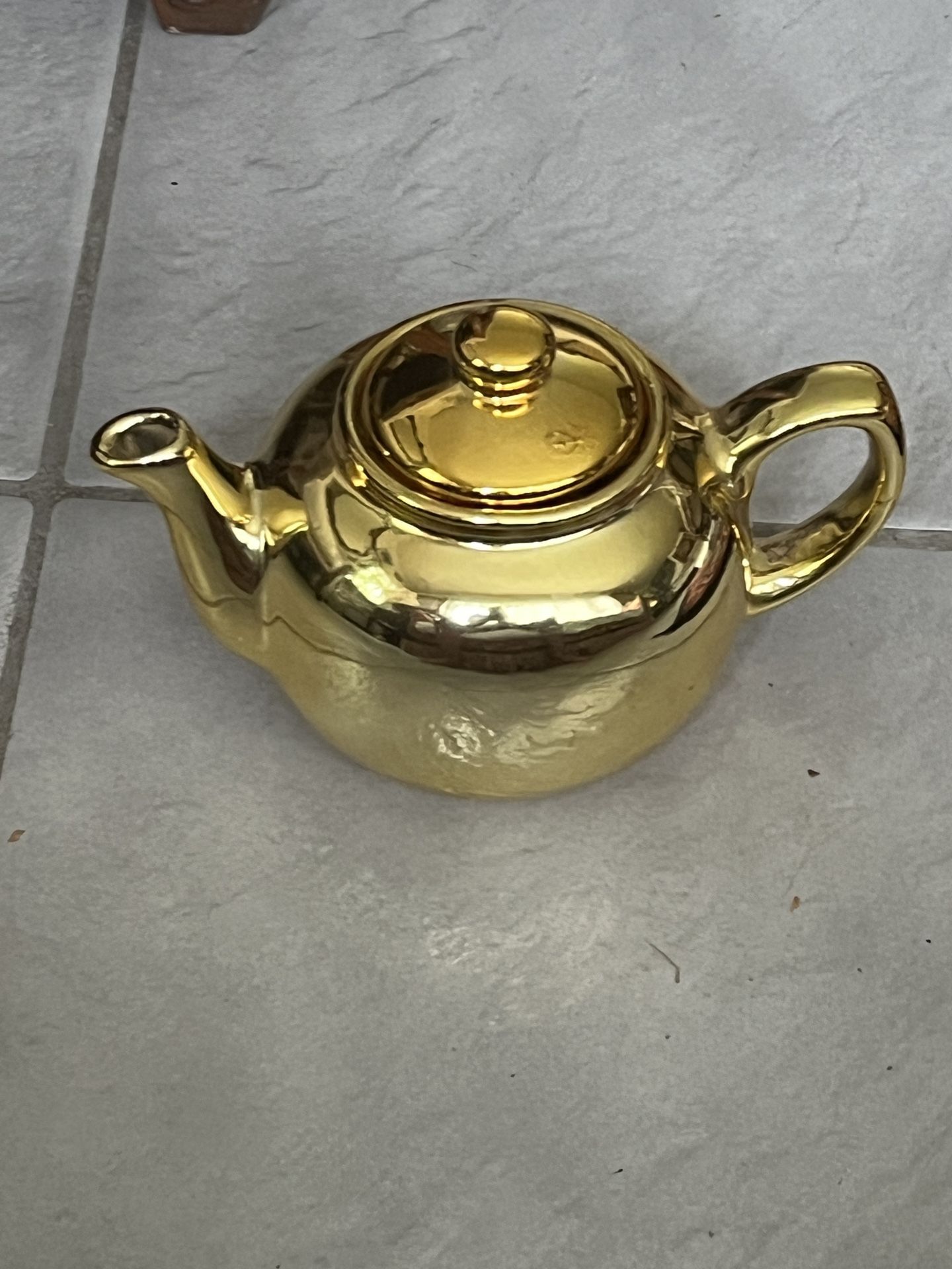 Gold Teapot by Cooks Club Inc. approx H4.5”W7.3/4” Handle to spout