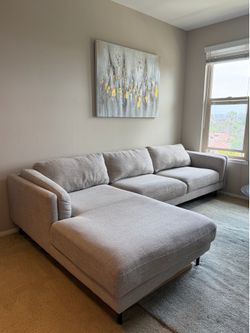 Light grey sectional sofa