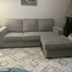 Grey sofa with Reversible chase