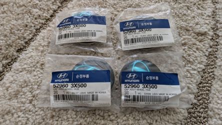 Genuine wheel center cap Hyundai Elantra Ioniq Veloster