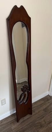 5’ vintage dark wood wall mirror Art Nouveau-inspired fluid cutout frame carved floral accent