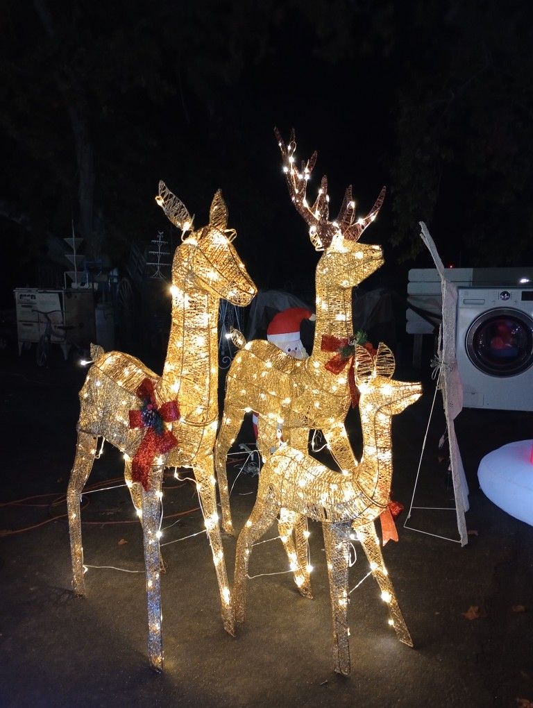 Reindeer Family, Tree With Decorations And Lawn Ornaments