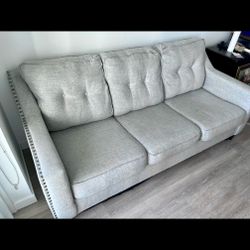 NEEDS TO GO!!! Comfy Couch - Light Grey Fabric, Studs on Arms