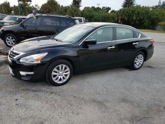 2014 nissan altima con 58 millas