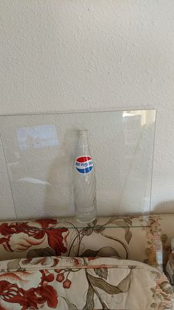 Diet Pepsi half bottle glued to 1/4 " glass